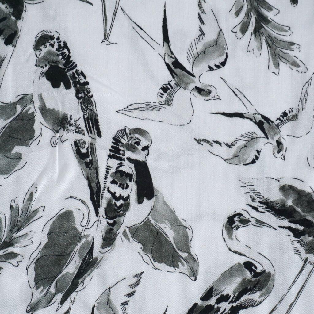 Viskose Druck Sittiche Kranich Zweige weiß grau